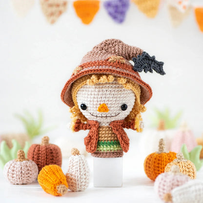 Halloween amigurumi figures arranged as fall decor