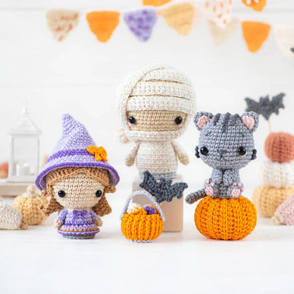 Close-up of handmade Halloween crochet figures