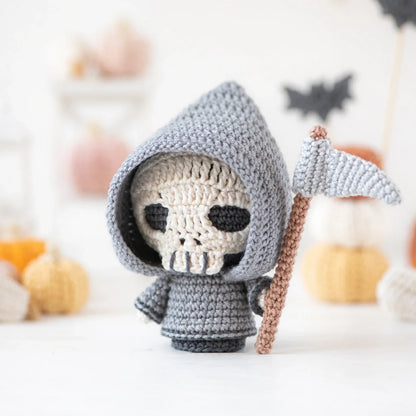 Mini Halloween amigurumi set displayed on a shelf