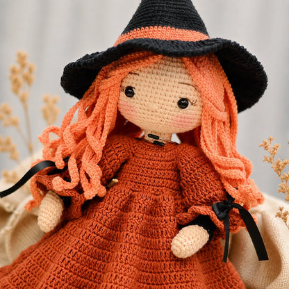 Close-up of Beatrix's crocheted witch hat and face
