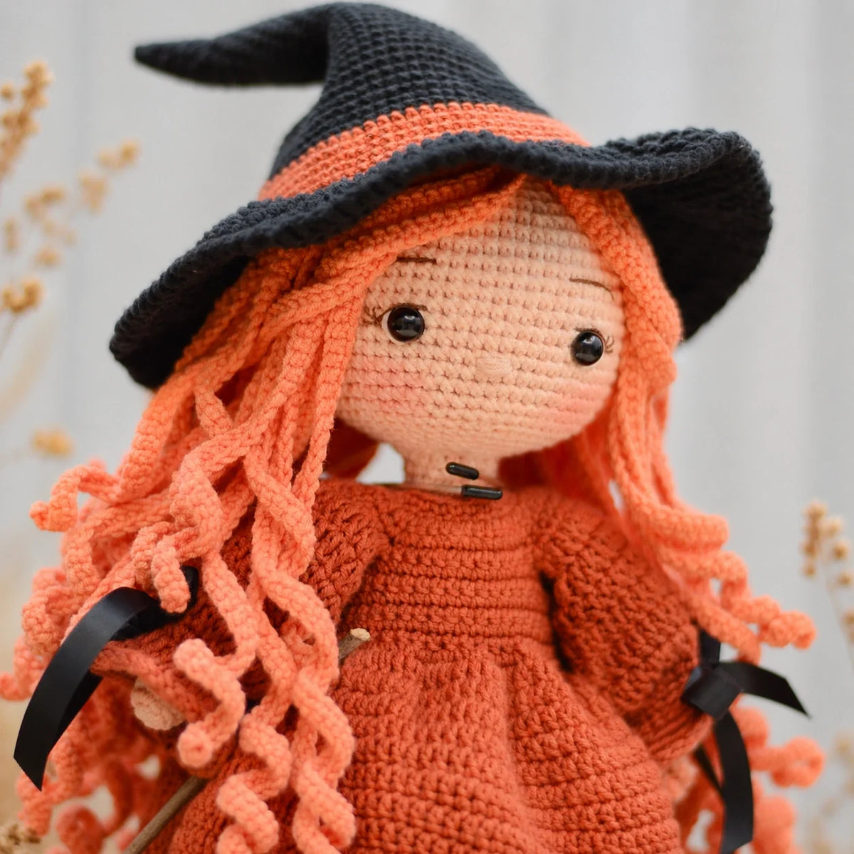 Beatrix witch doll displayed as Halloween decor