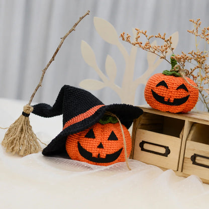 Amigurumi pumpkins arranged as fall table decor
