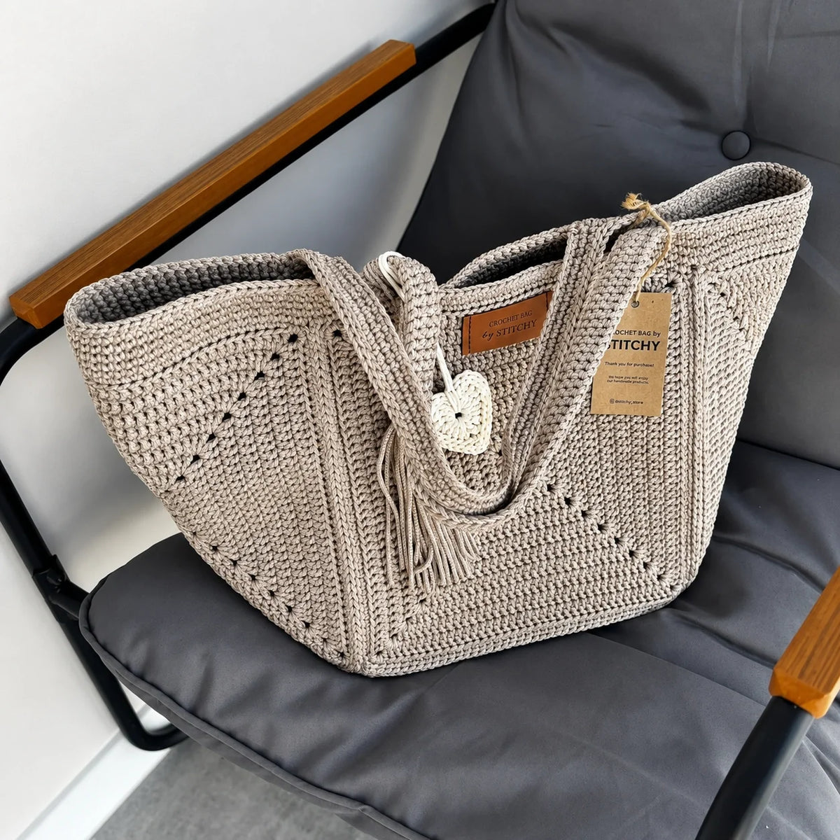 Close-up of the textured granny square panels on the tote