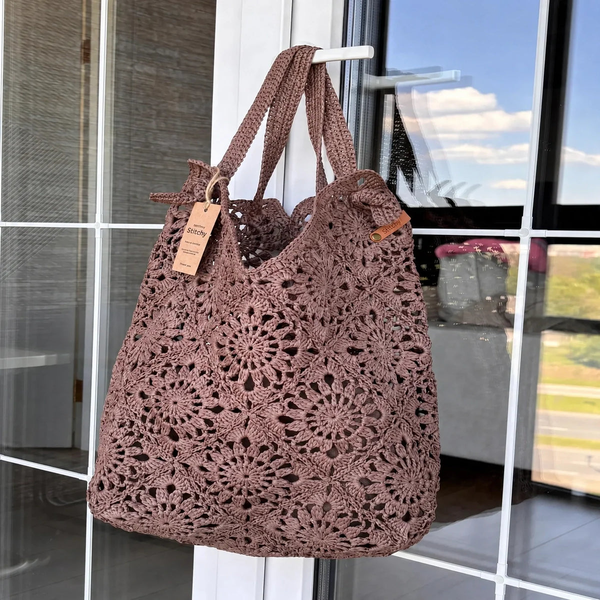 Crochet raffia Likebag styled with a summer outfit