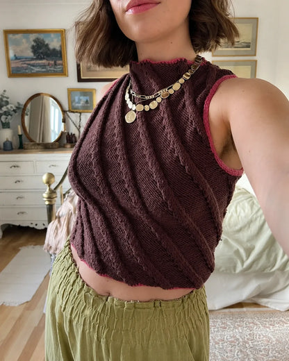 Cropped Twister Tank showing the high neckline and twisted cable columns