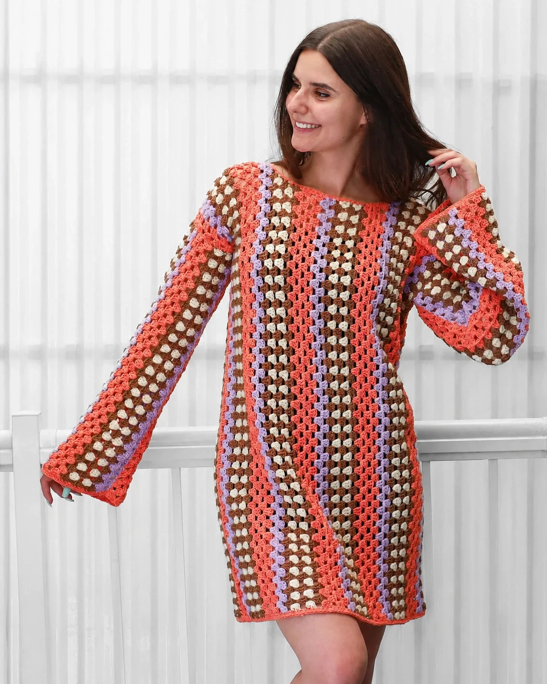 Model wearing the Taylor granny stitch crochet dress outdoors