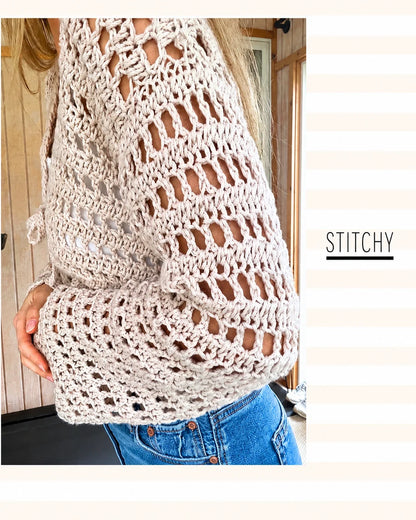 Back view of the crocheted open mesh cardigan