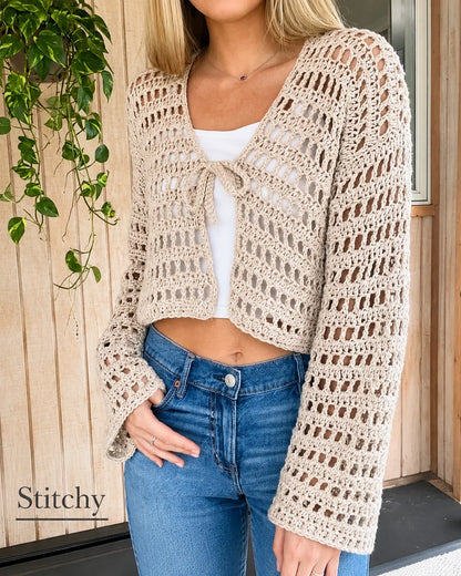 Crochet tie-front cardigan styled with a summer dress