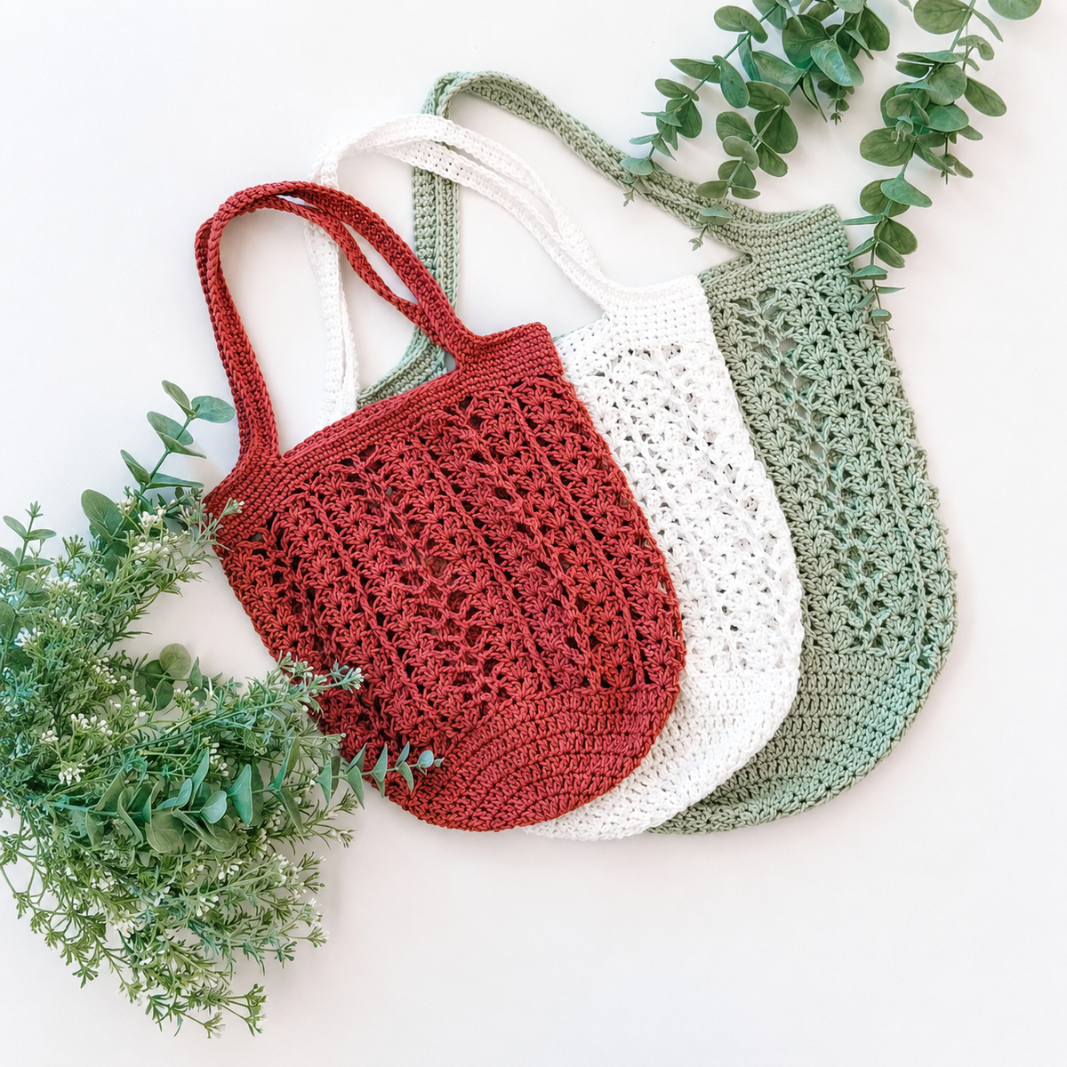 Handmade crochet mesh bag on a beach day