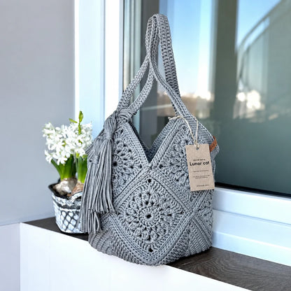 Crocheted market bag styled outdoors
