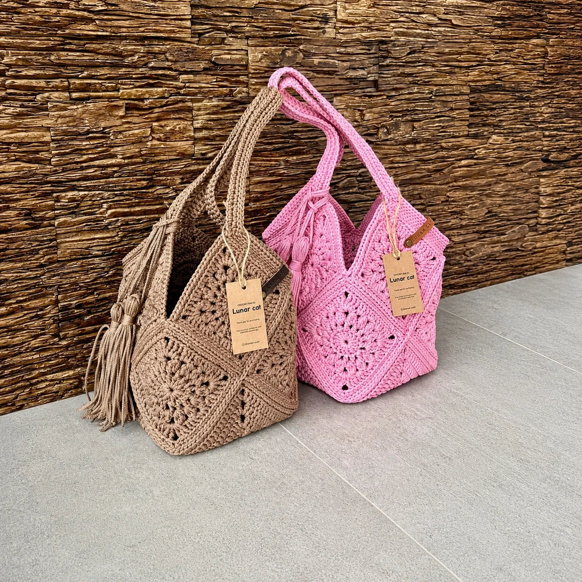 Crochet market bag with decorative tassel detail