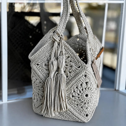 Crocheted market bag filled with groceries