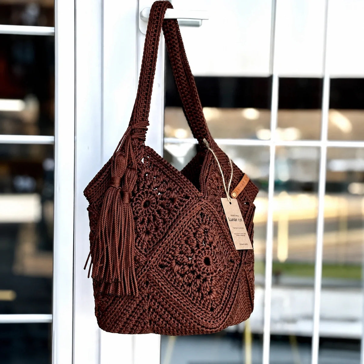 Side view of the granny square crochet market bag