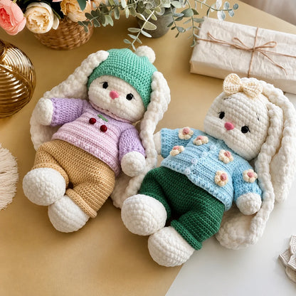 Bella the Bunny amigurumi sitting on a nursery shelf