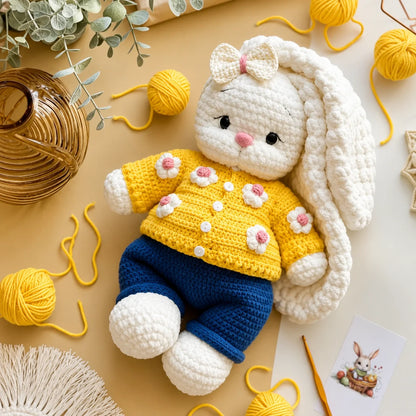 Hand-crocheted Bella bunny dressed in her hat and sweater
