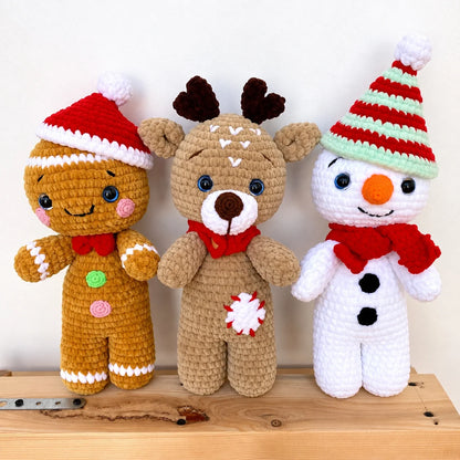 Close-up of the crocheted amigurumi reindeer with antlers and red nose
