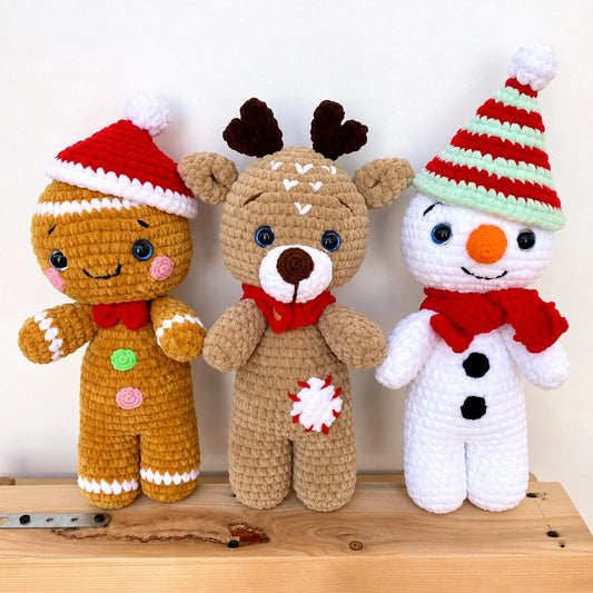 Close-up of the crocheted amigurumi reindeer with antlers and red nose