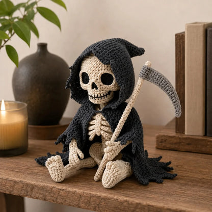 Close-up of the crocheted skull face and dark hood