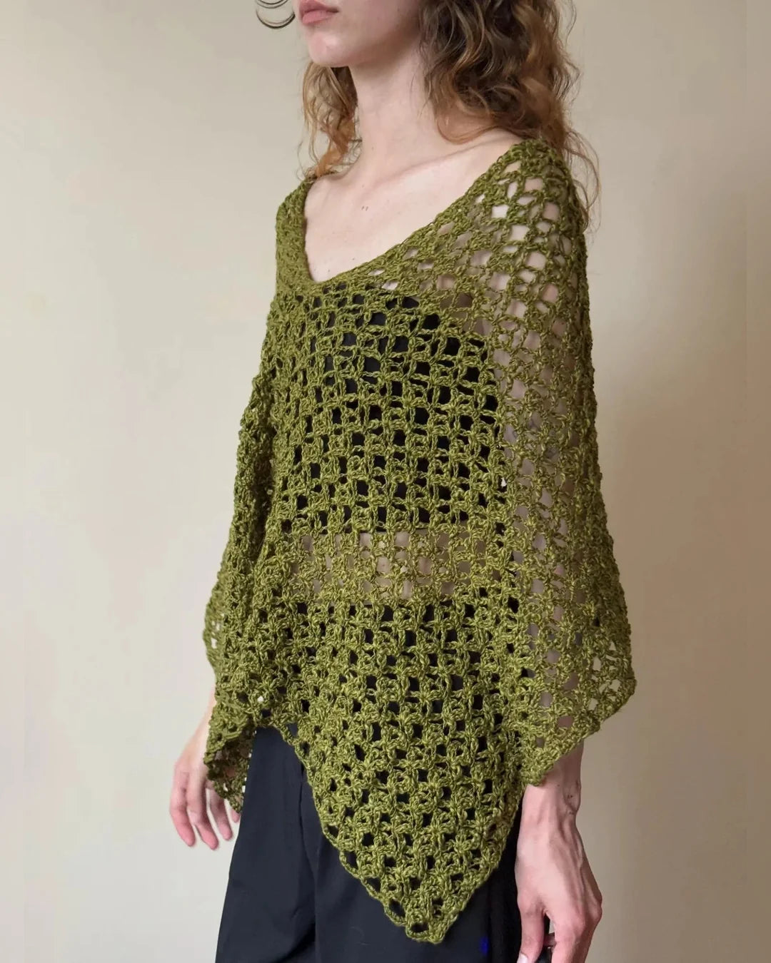 Close-up of the airy openwork stitch pattern on the NOA poncho top