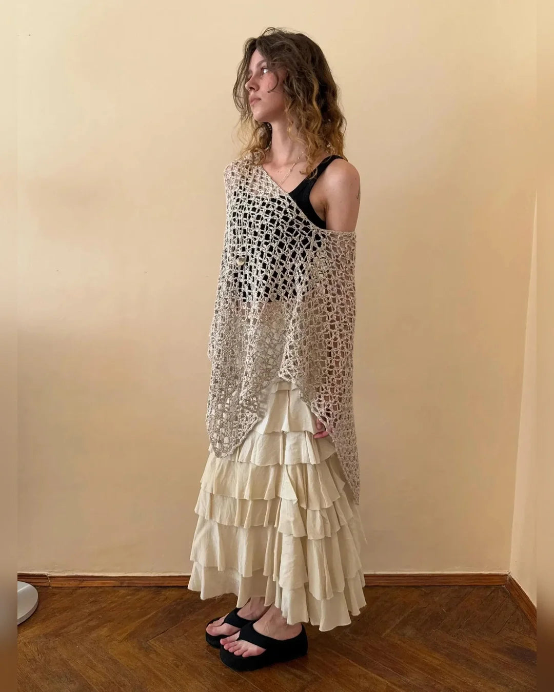 NOA poncho top worn off one shoulder