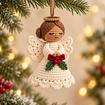 Cream crochet angel ornament with gold halo brown hair wings and holly bow