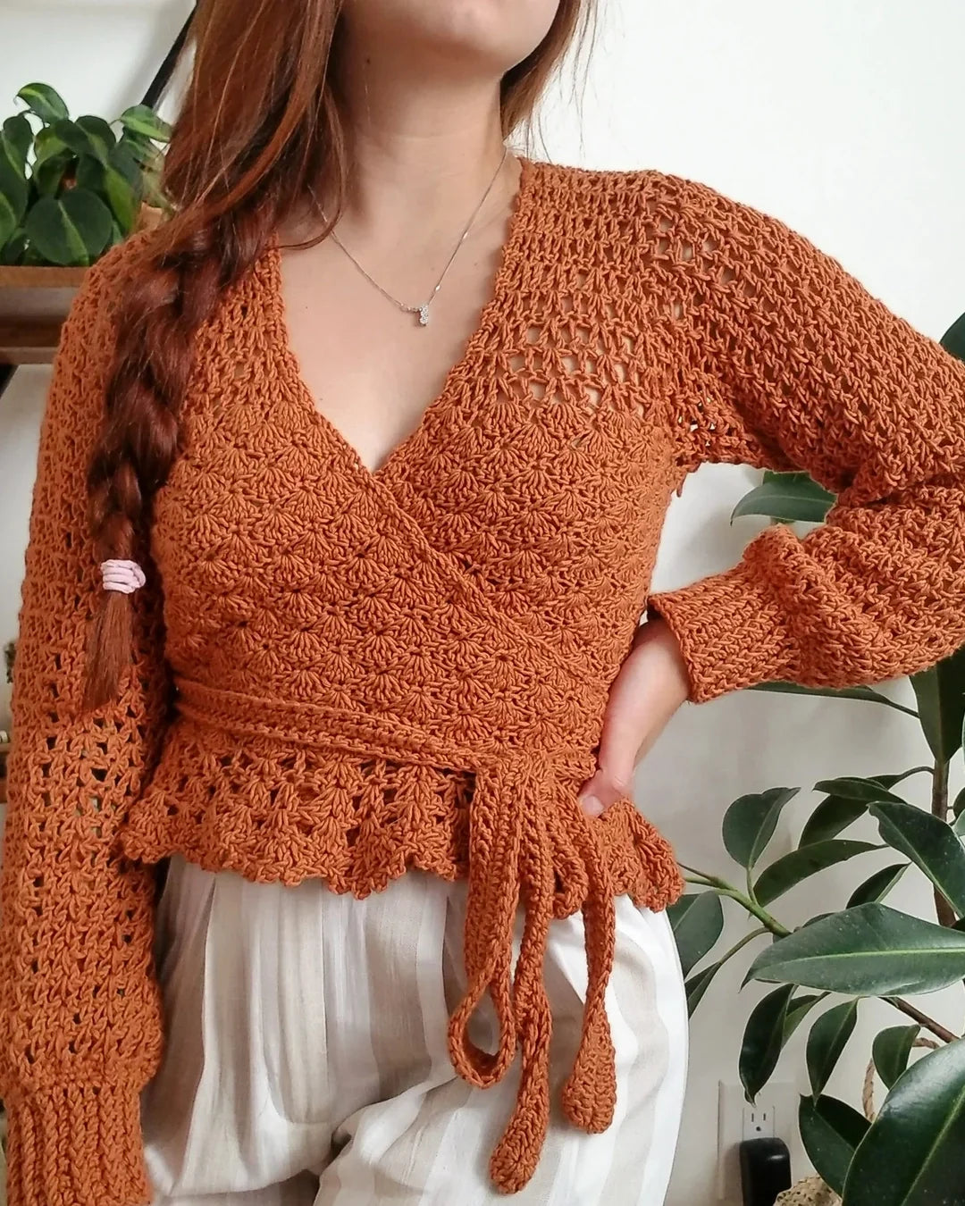 Crocheted Foxglove wrap top with peplum and lace bishop sleeves, worn