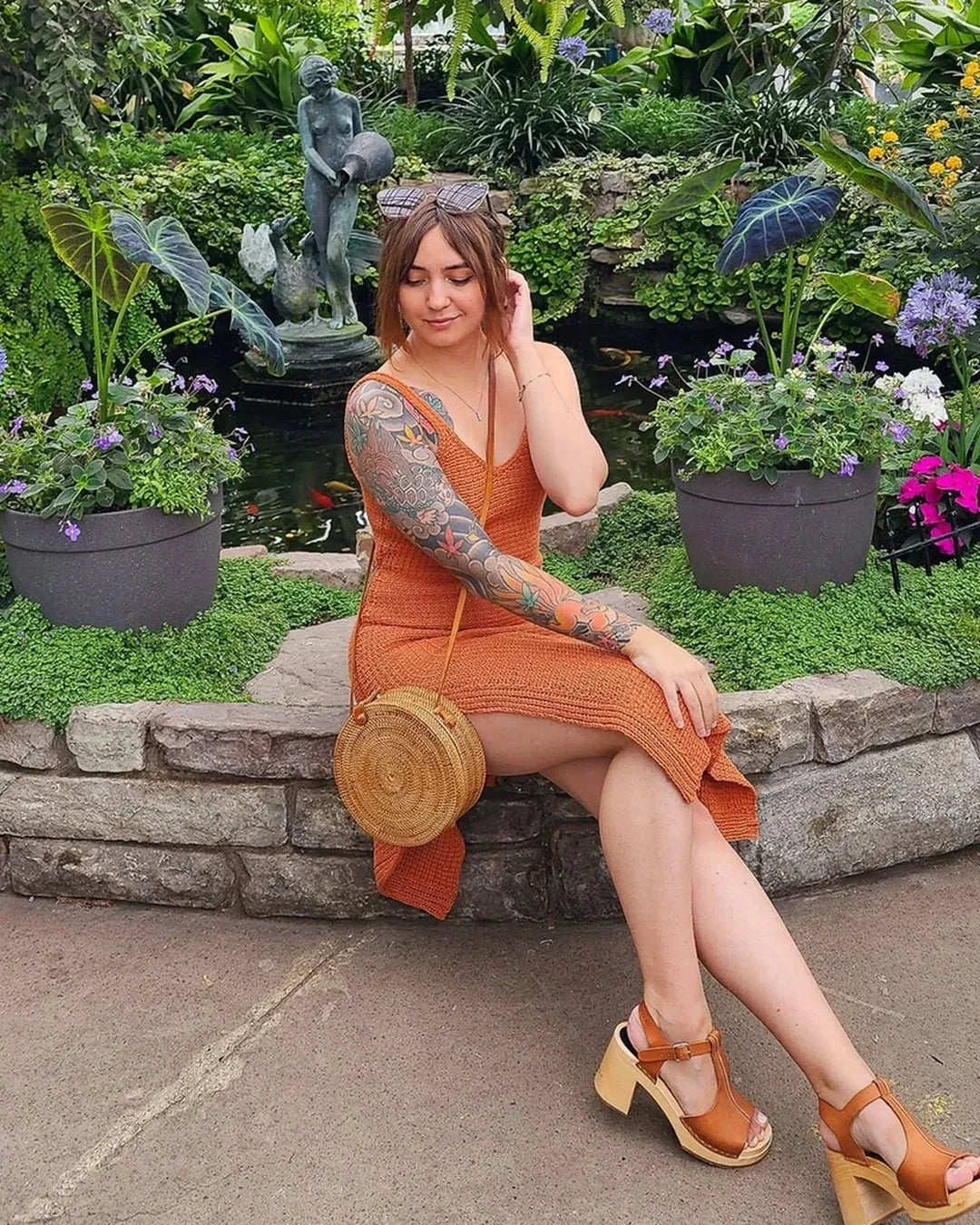 Detail of the overlapping cuffs on the dress leg slits