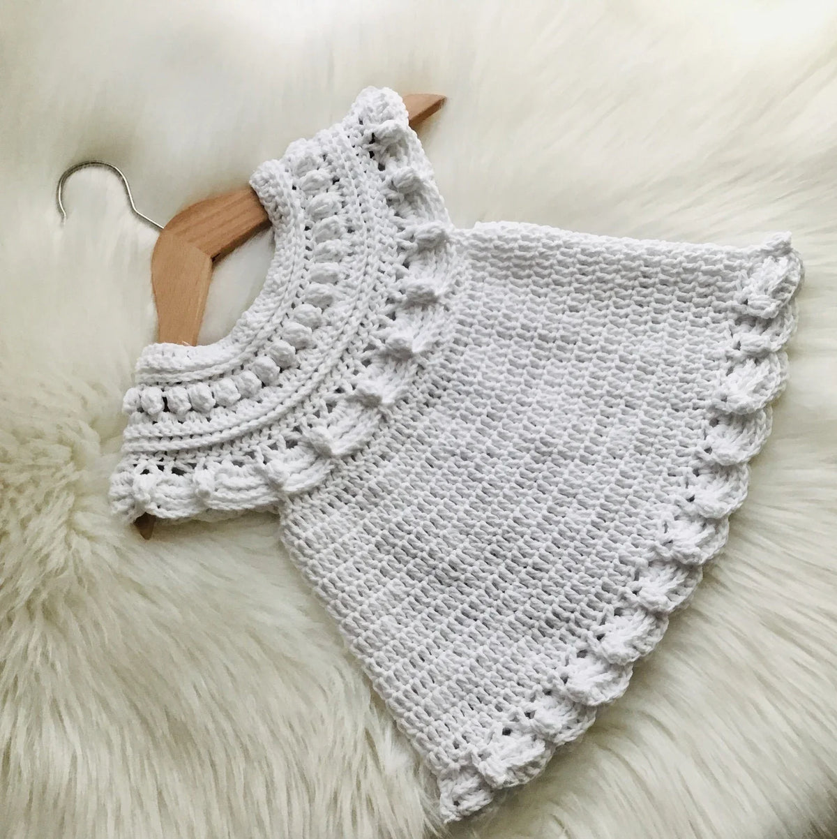 Moonpetal baby dress showing the ruffled skirt detail