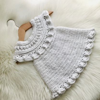 Moonpetal baby dress showing the ruffled skirt detail