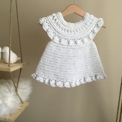 Back view of the crocheted Moonpetal baby dress