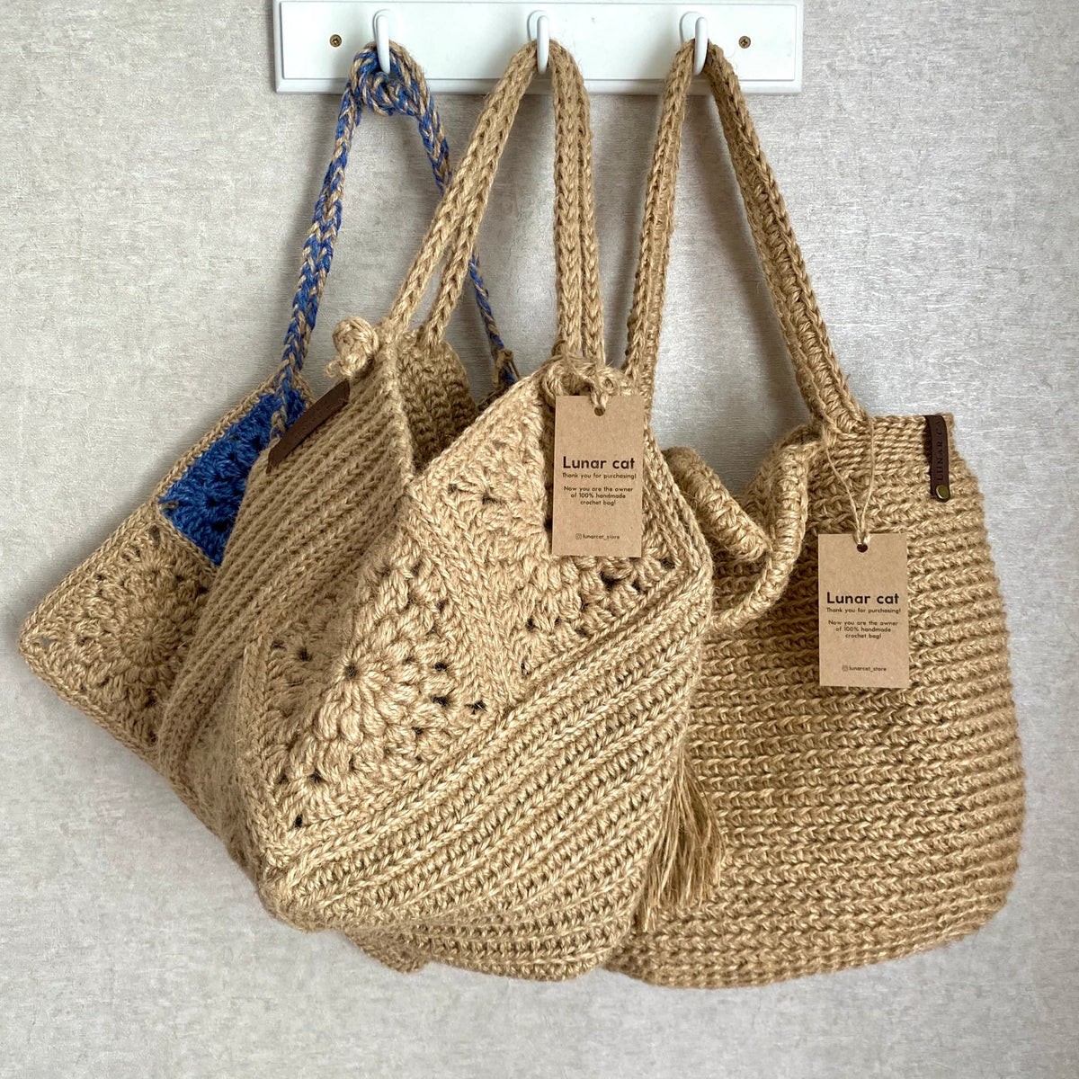 Crocheted jute bag with granny squares, side view