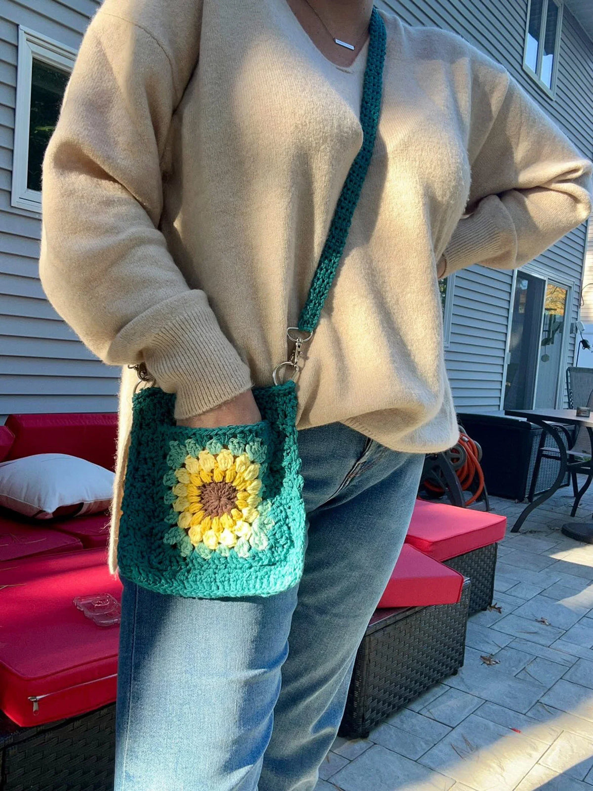 Sunflower granny square bag with strap and hardware detail