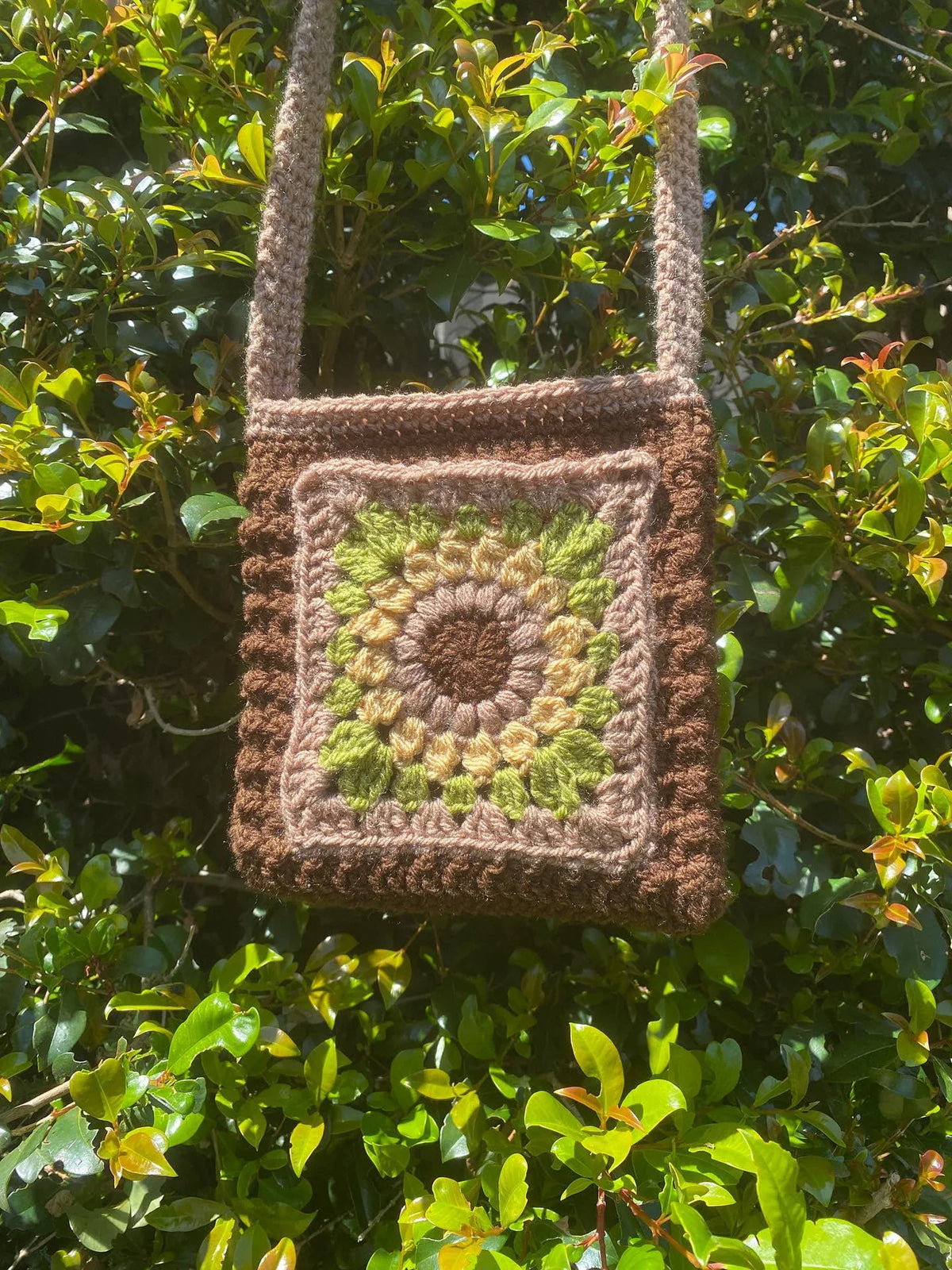 Handmade sunflower crossbody bag styled with a summer outfit