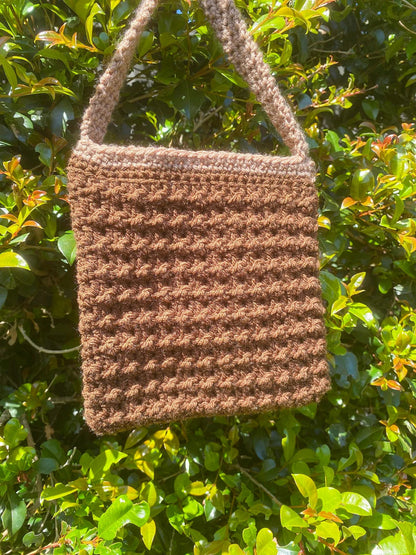 Sunflower crochet bag on a neutral background, product shot