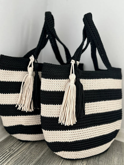 Striped crochet tote bag standing upright to show its shape