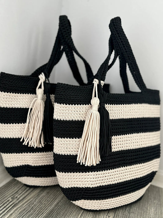 Striped crochet tote bag standing upright to show its shape