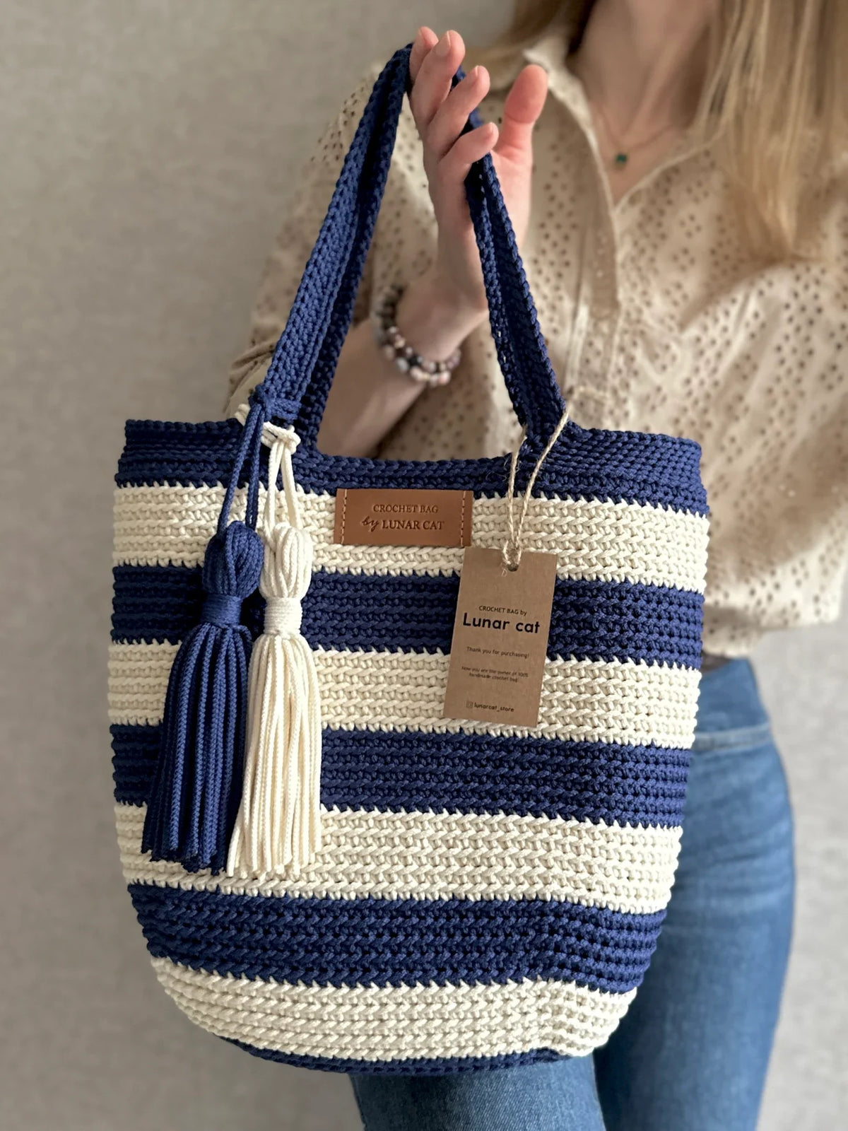 Roomy interior of the striped crochet tote bag