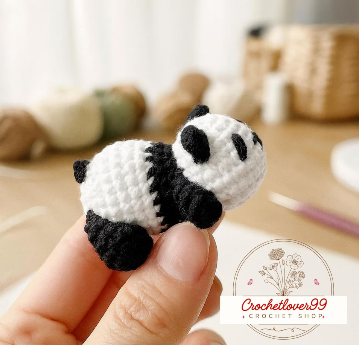 Close-up of small crocheted amigurumi keychain figures