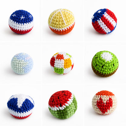 Assortment of striped and multicolor crochet footballs