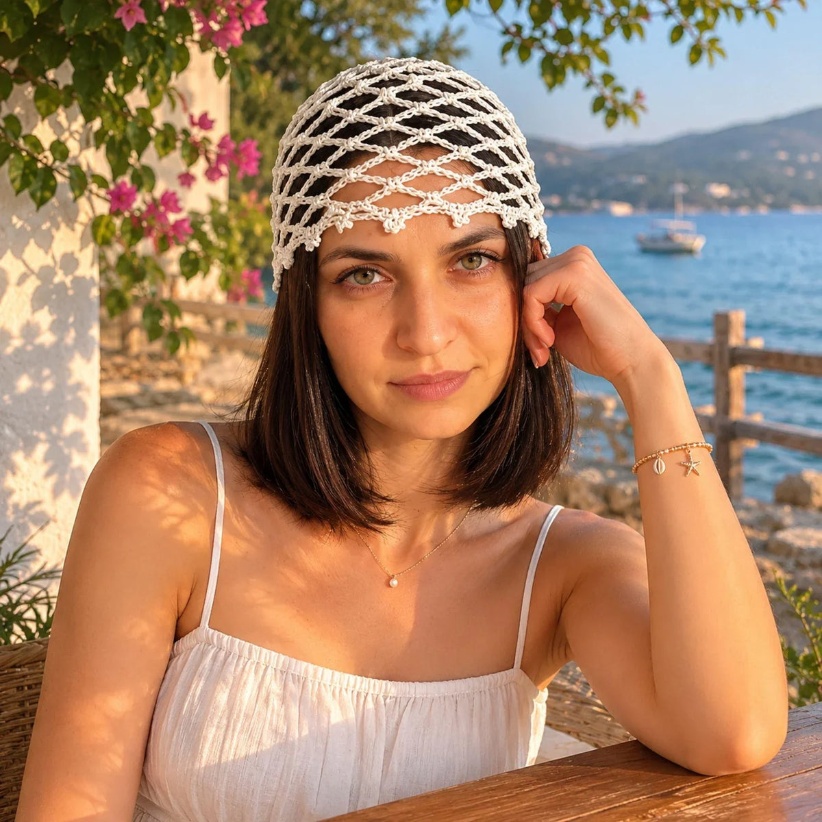 Crocheted boho mesh hair net beanie worn over long hair