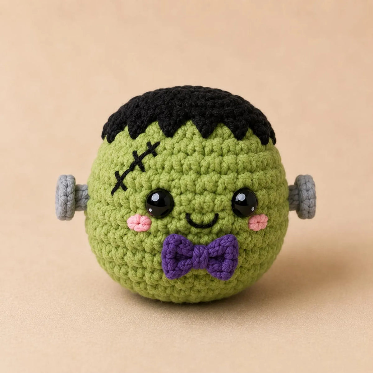 Round crochet ghost amigurumi in kawaii bao bun style