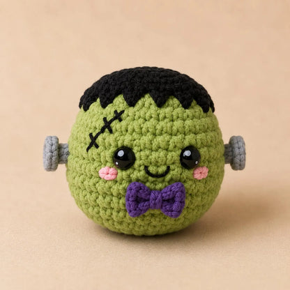 Round crochet ghost amigurumi in kawaii bao bun style