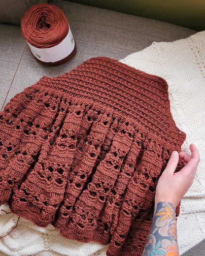 Model wearing the handmade Love in Her Eyes crochet dress
