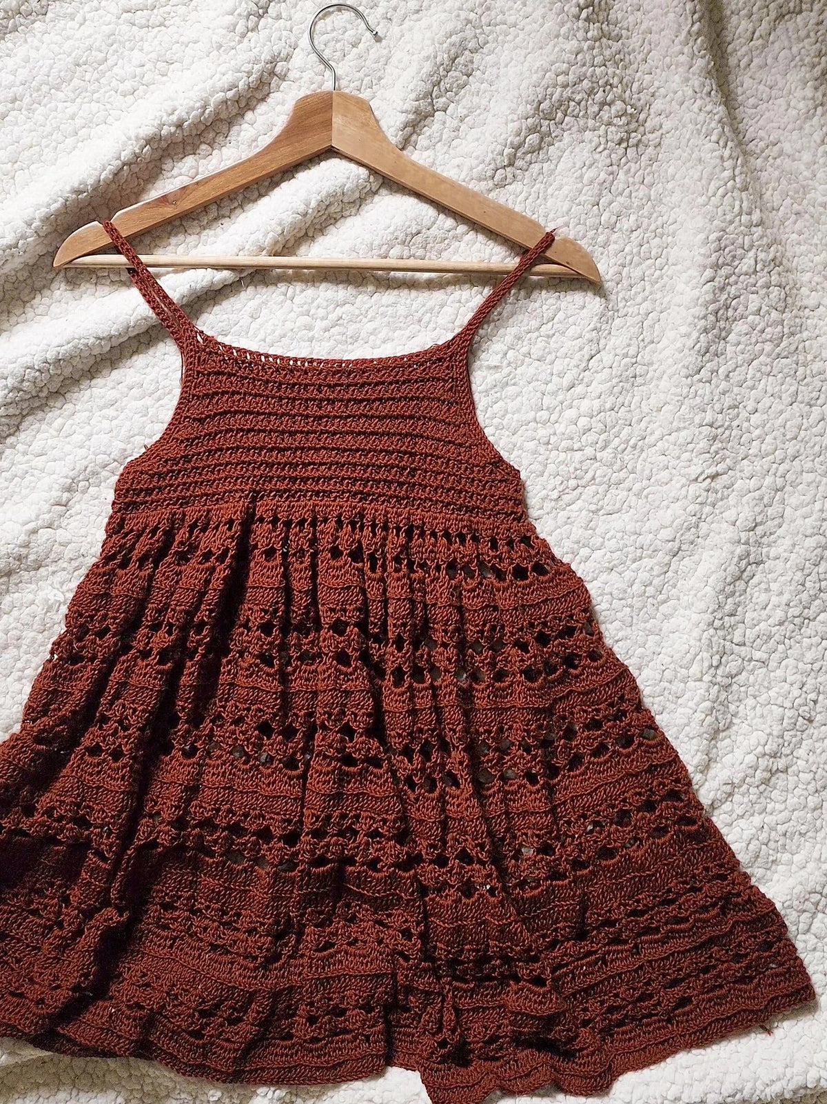 Side view of the loose-fitting crochet babydoll dress