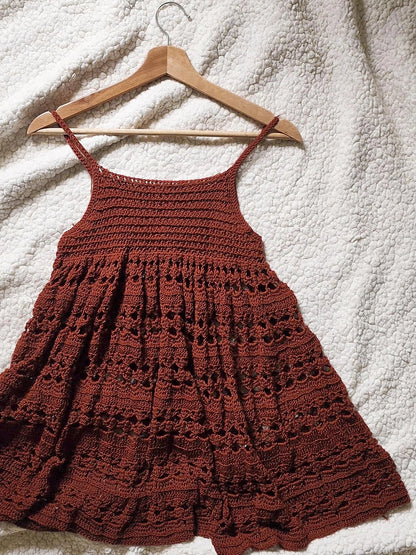Side view of the loose-fitting crochet babydoll dress