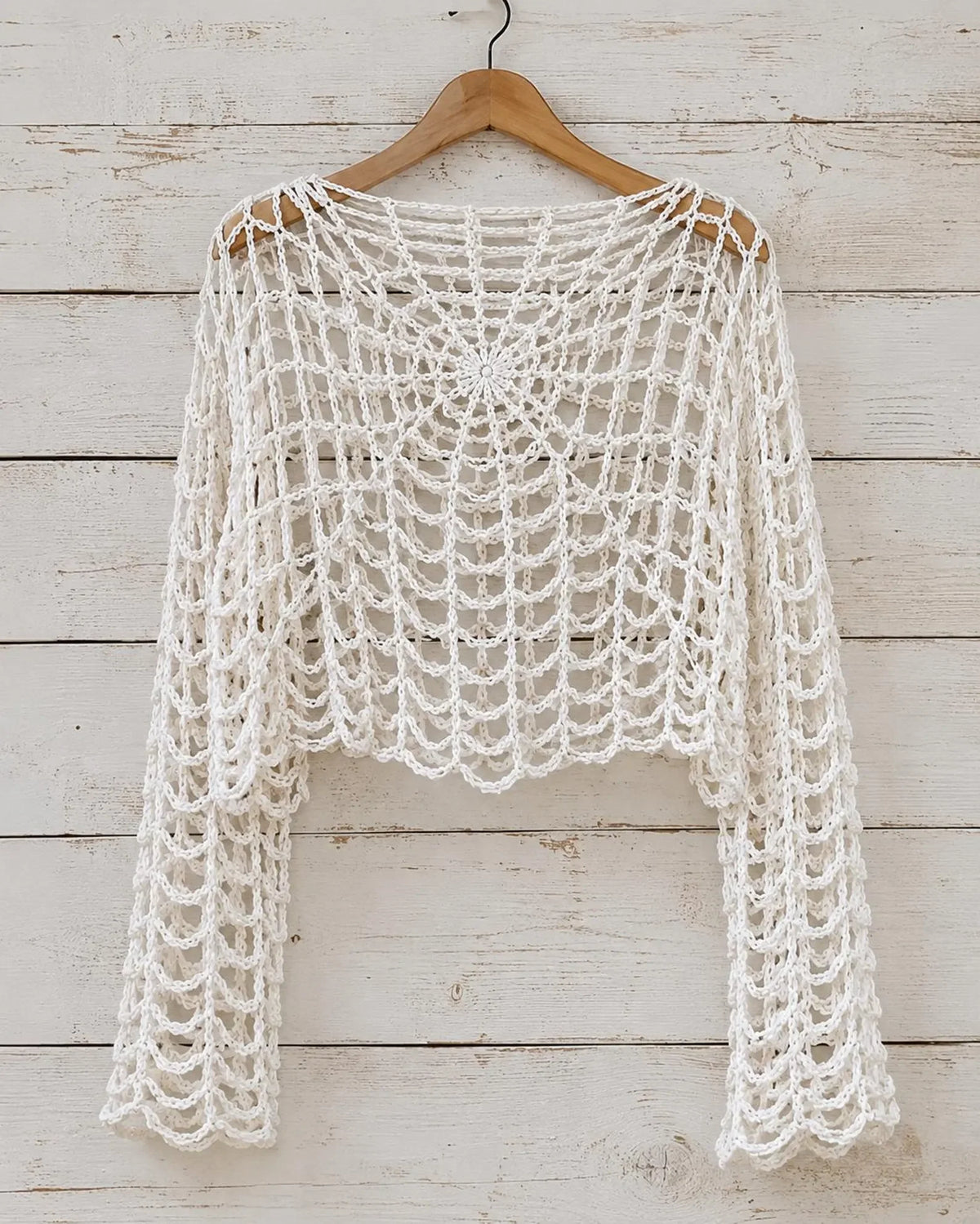 Spider web crochet crop top showing the open web stitch pattern