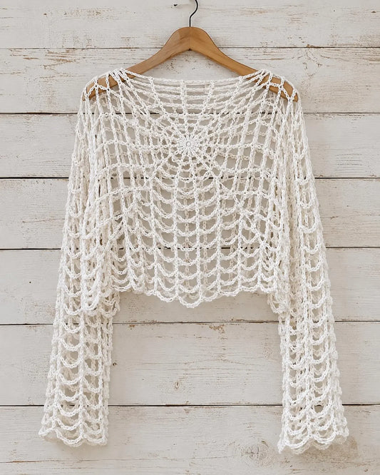Spider web crochet crop top showing the open web stitch pattern