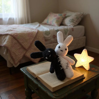Two-headed Halloween bunny amigurumi displayed as spooky decor