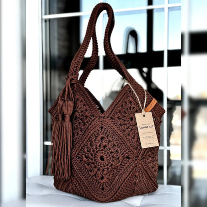 Handmade crochet market bag flat lay