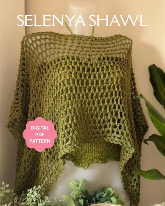 Crocheted Selenya shawl poncho worn over a simple outfit